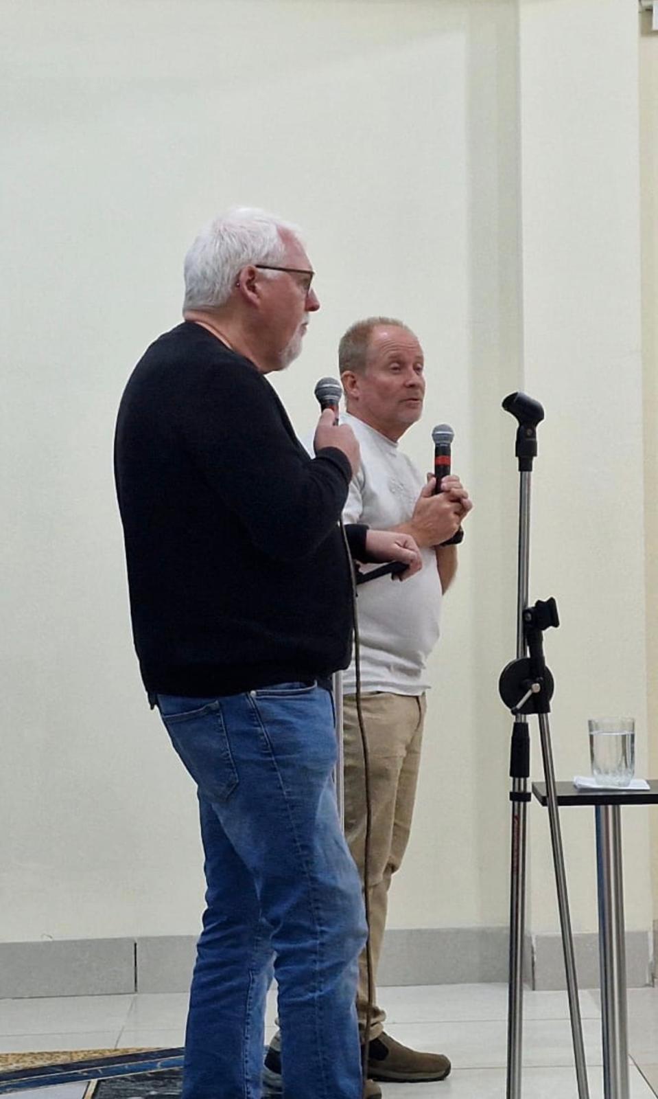 David Larson sharing the platform with another preacher