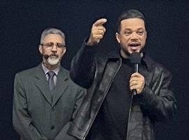 A visiting minister teaching the Word during a RHEMA demo class night
