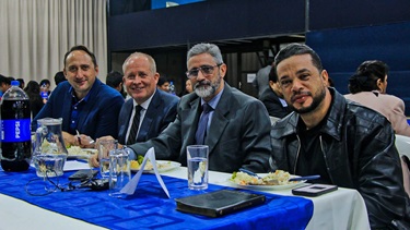 Visiting pastors from the USA and Brazil seated at the pastors' dinner