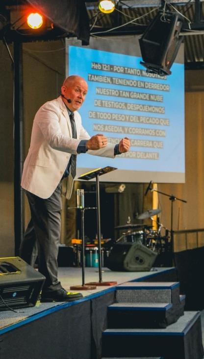David Larson preaching Hebrews 12:1 with passion