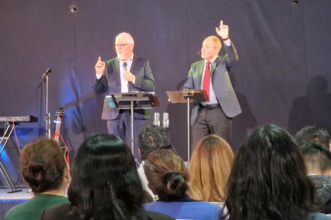 David Larson preaching at a Sunday service